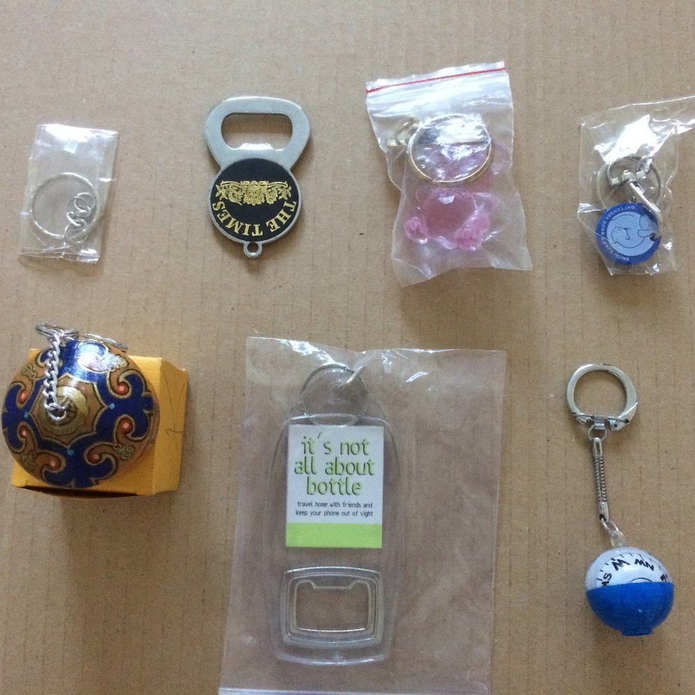 - key rings, bottle opener, lanyards, souvenirs the lot